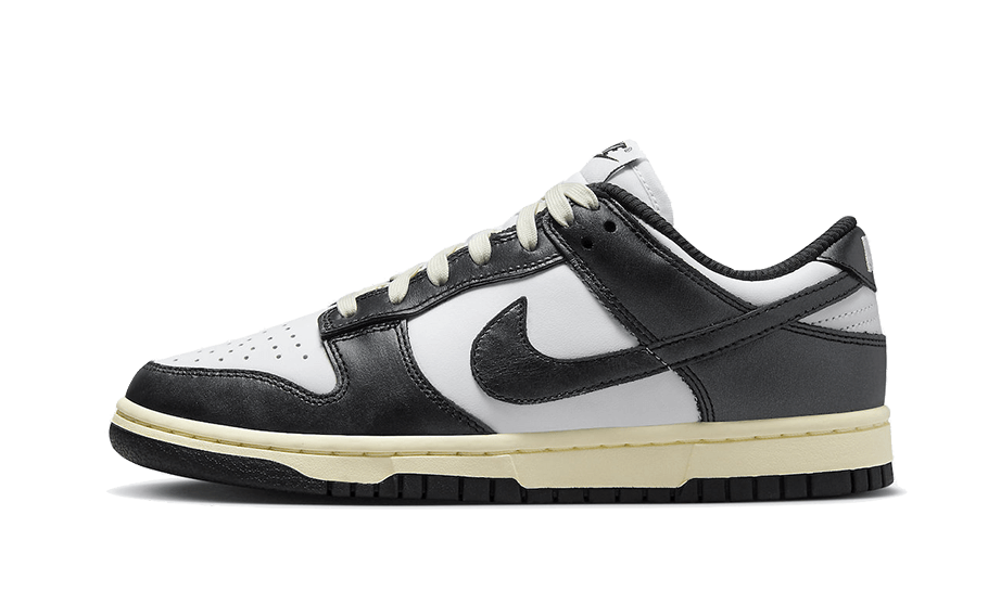 FQ8899-100_1 Nike Dunk Low Vintage Panda - Image 1