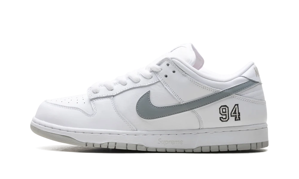 HQ8487-100_1 Nike SB Dunk Low Supreme White Metallic Silver - Image 1